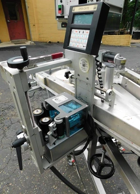 USED NEWMAN WRAP AROUND LABELER NV II