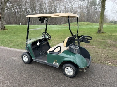 (1) 2015 E-Z-Go golf cart with a Kawasaki gas engine, does not include Club canopy, includes ball wa...