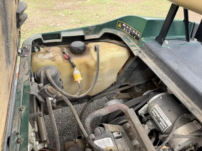 (1) 2015 E-Z-Go golf cart with a Kawasaki gas engine, does not include Club canopy, includes ball wa...
