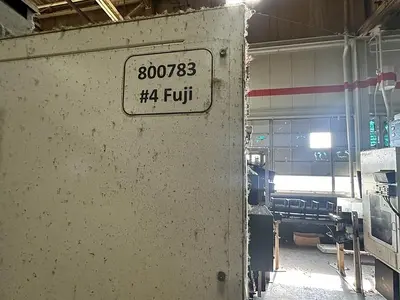 Used FUJI ANW 35 TWIN TURRET CNC LATHE, TAIL STOCK WITH ROBOT LOAD/UNLOAD AND STOCKER TABLES CNC Lathes | Harbor Machinery Inc. #1283395