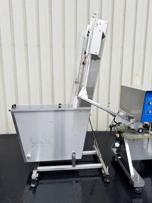 Inline Filling Systems Inline Capper with Waterfall Cap Sorter