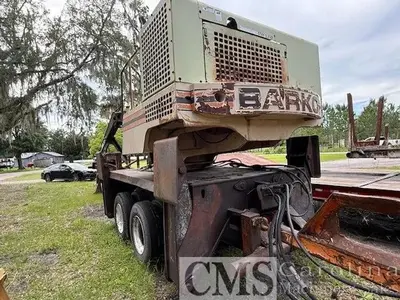 USED 2004 BARKO 395ML LOG LOADER WITH 42 IP CTR SLASHER SAW