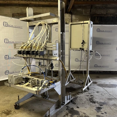6 Head ELF Filler with feed tanks & container link belt conveyor