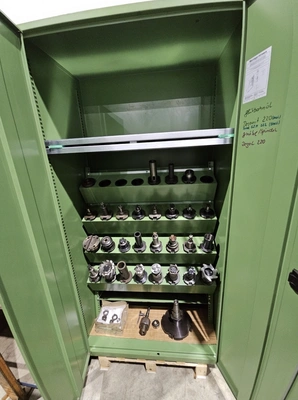 Lot of tables, angle plates and SK 50 toolholders, PRICE FOR LOT