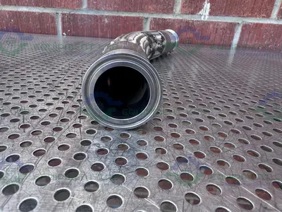 USED HARRINGTON STAINLESS STEEL BRAIDED HOSE 15" W/ 1 1/2" SANITARY FITTING
