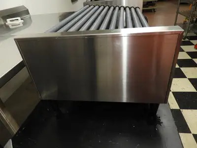 Used Nemco Used Nemco 8250-SLT 50 Commercial Hot Dog Roller Grill - Slanted Top, 120v Grills & Griddles Illinois US | Falcon Restaurant Supply #1376520