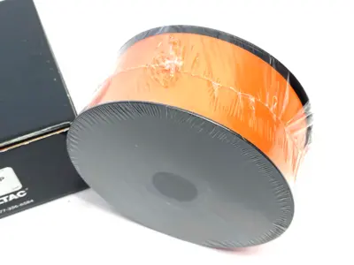 USED LABELTAC PRO MODEL HIGH PERF. 10 YEAR VINYL LABEL ORANGE, 2"X 150'/ ROLL
