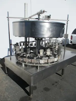 Gravity feed, 1 gallon bottle filling machine w/ 24 heads