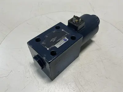 USED REXROTH 4WE 10 D33/CG24N9K4