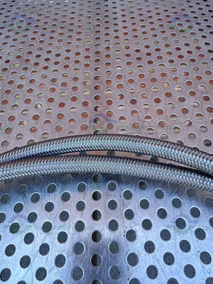 USED 66" STAINLESS STEEL FLEXIBLE BRAIDED HOSE W/ QUICK CONNECTIONS