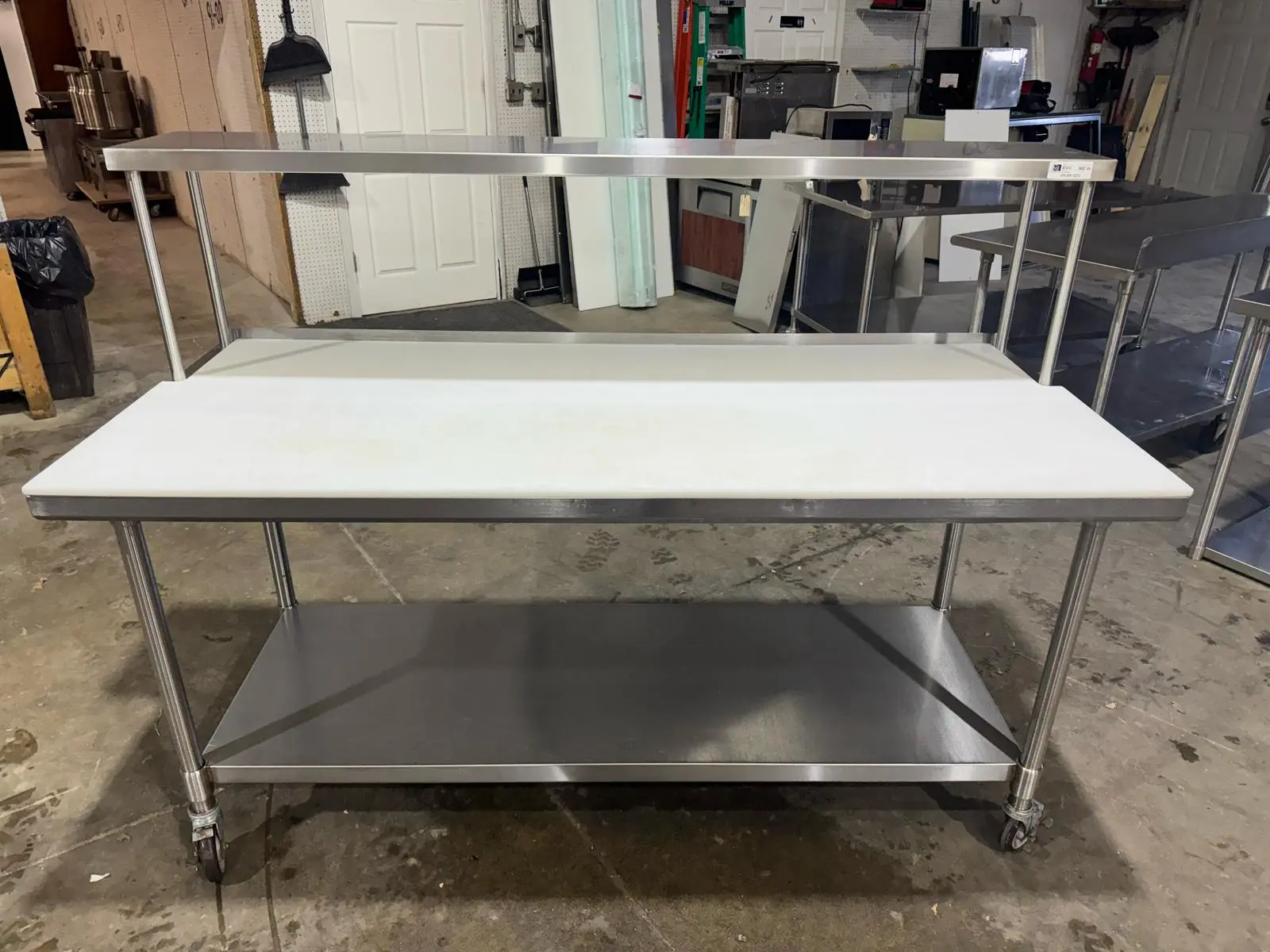 Used John Boos Used John Boos 36"x72" Stainless Table with Overshelf, Casters and Cutting Board Food Prep Tables Illinois US | Falcon Restaurant Supply #1375674