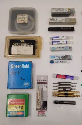 ASSORTED TOOLING SET - 42 PIECE MIX OF TAPS, DIES, DRILLS, AND END MILLS