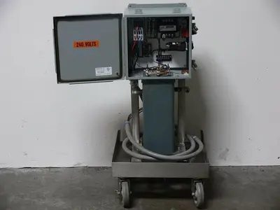 USED ENCLOSURE WITH 2 CARLO GAVAZZI RA4890HA12, MICRON B100MBT713XK  / CONTROLLER