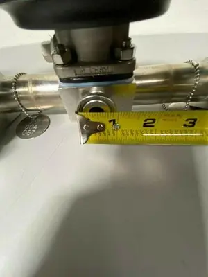 USED 2 ITT 1" & 2 ITT 1/2" 60 PSI VALVES ON MANIFOLD W/ 1/2" & 1" SANITARY FITTINGS