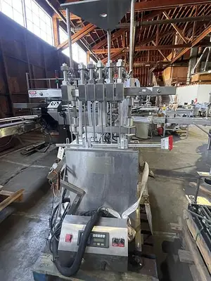 USED INLINE FILLING SYSTEMS 6 HEAD RINSER