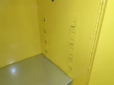 Uline H-1563M-Y Yellow Flammable Safety Cabinet Dual Door 30 Gallon Liquid
