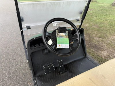 (1) 2015 E-Z-Go golf cart with a Kawasaki gas engine, includes canopy, ball cover, club cover, fold-...