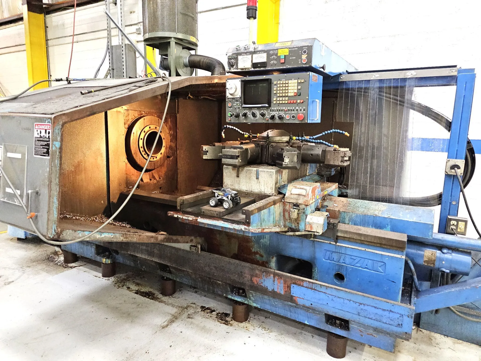 1981 MAZAK POWER-MASTER 24" Chuck Cap, 8 Station Heavy Duty Turret with All Tool Holders Fanuc 6TB CNC Control 9-3/4" Spindle Bore,
