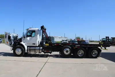 New | in-Stock 2027 PETERBILT 548 Rolloff Trucks Texas US | Roll Off Truck World #1492012