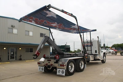 Used 2027 PETERBILT 548 Hooklifts & Roll-Offs Texas US | Roll Off Truck World #1491992