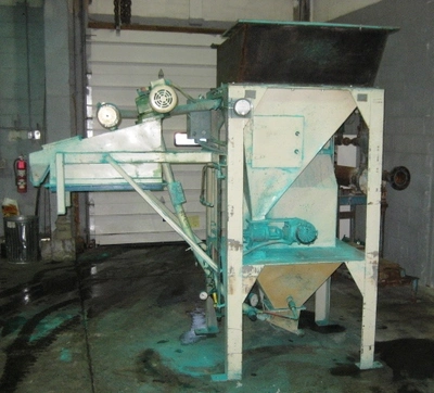 Steel hopper with rotary valve and spiral feeder