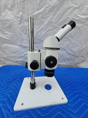 WILD HEERBRUGG MICROSCOPE WITH 2 EYEPIECES WF10X22