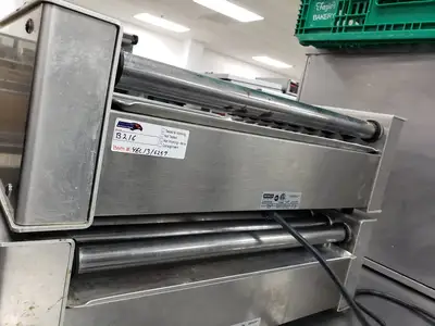 Used Nemco Used Nemco 8027 Hot Dog Roller Grill - 27 Hot Dog Capacity (110V) Grills & Griddles Illinois US | Falcon Restaurant Supply #1376800