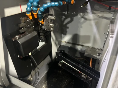 2013 Tsugami B0203-ii CNC Swiss Machine with Bar Feeder