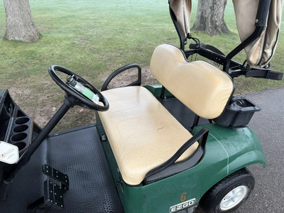 (1) 2015 E-Z-Go golf cart with a Kawasaki gas engine, includes canopy, ball cover, club cover, fold-...