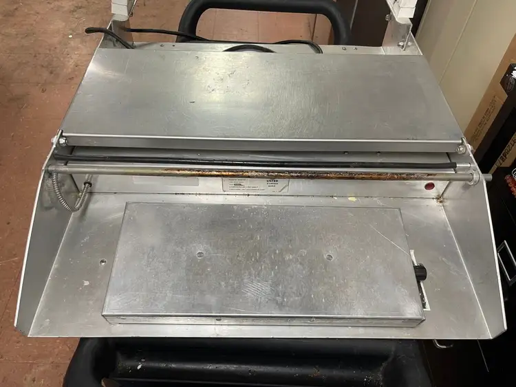 Used Falcon Restaurant Supply Used Heat Seal Food Wrapper 18" Width Single Roll 6X15 Hotplate 120V Wrappers - Roll Illinois US | Falcon Restaurant Supply #1376211