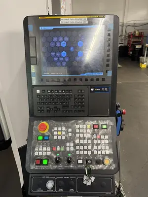 2023 Doosan Mdl DVF-5000 5 Axis CNC Vertical Machining Center w/ 12 Pallet AWC