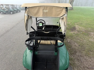 (1) 2015 E-Z-Go golf cart with a Kawasaki gas engine, includes canopy, ball cover, club cover, fold-...