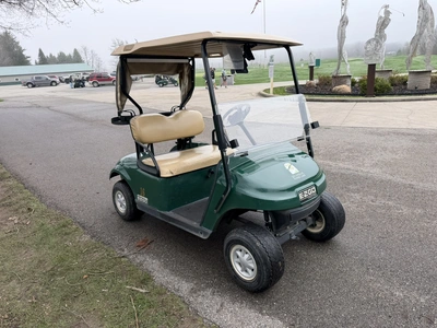 (1) 2015 E-Z-Go golf cart with a Kawasaki gas engine, includes ball washer and Club canopy, ball cov...