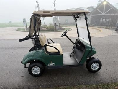 (1) 2015 E-Z-Go golf cart with a Kawasaki gas engine, includes canopy, ball cover, club cover, fold-...