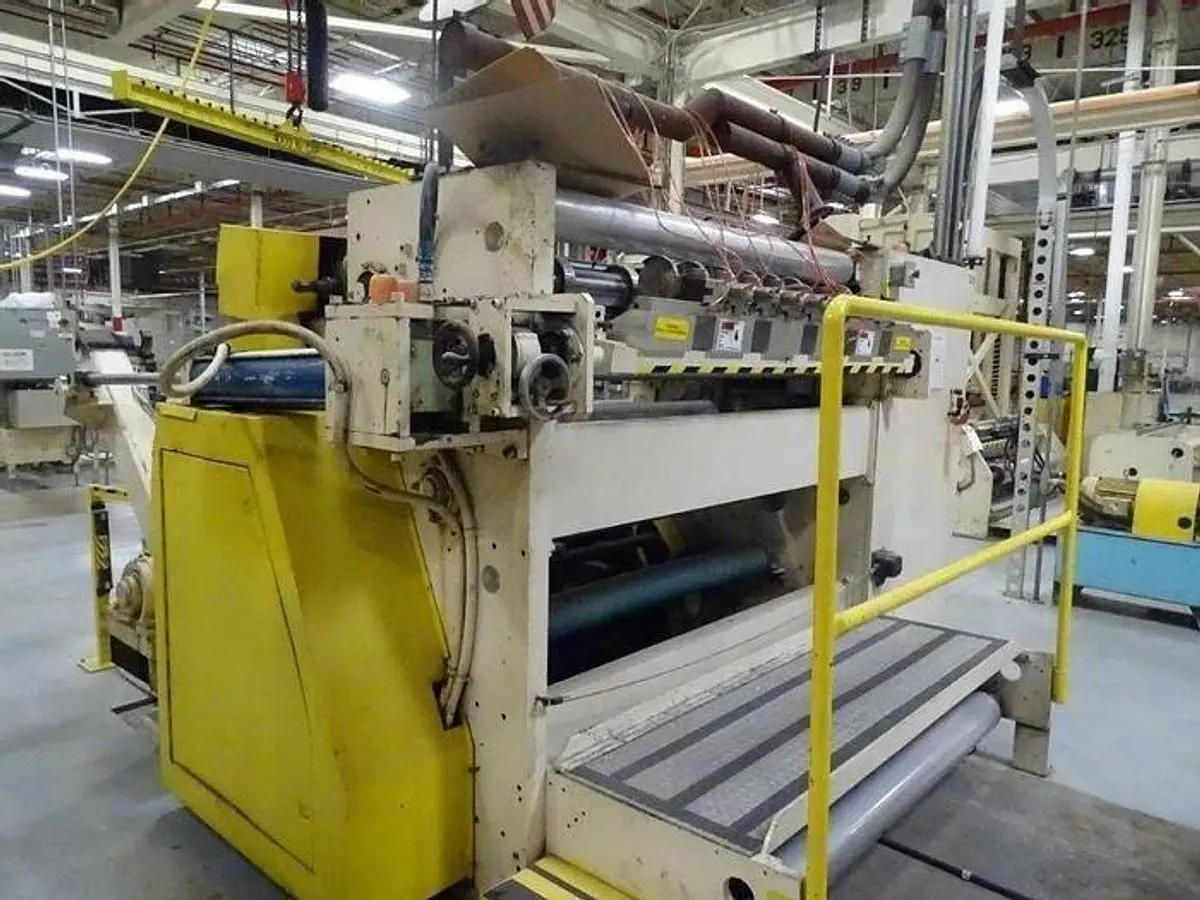 64" (1.60M) ARROW MDL 2000T SLITTER REWINDER 96" OD REWIND SHEAR CUT