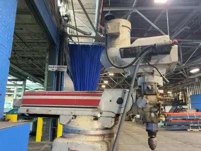Tri-onics Incorporated 50” X 10”  Vertical Mill