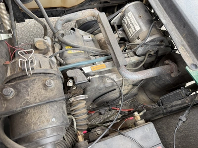 (1) 2015 E-Z-Go golf cart with a Kawasaki gas engine, does not include Club canopy, includes ball wa...