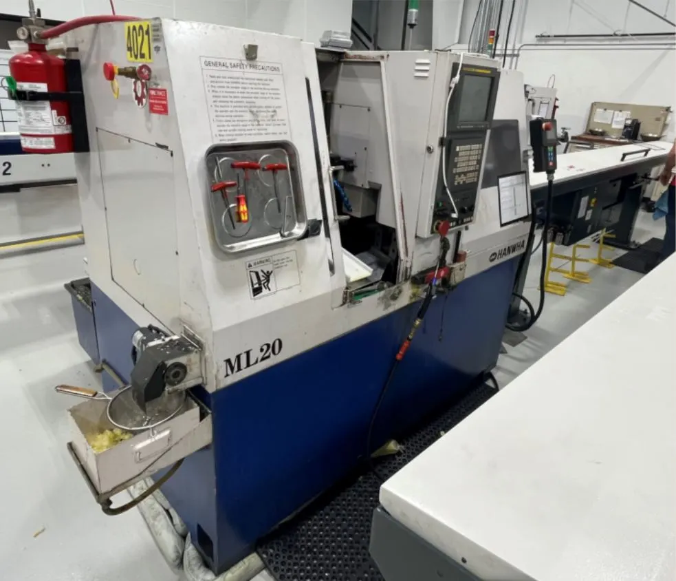Hanwha ML20 CNC Swiss Screw
Machine, New 2001