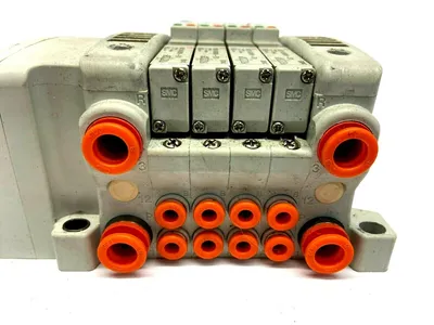 VV5QC11-04N3FD2 | SMC  D-Sub Manifold 4 Station w/ VQ1400N-51 Pneumatic Valves - Used