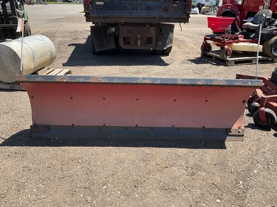 Boss 8’ straight blade snowplow, poly face, bolted on metal cutting edge. Spring trip, hydraulic ang...