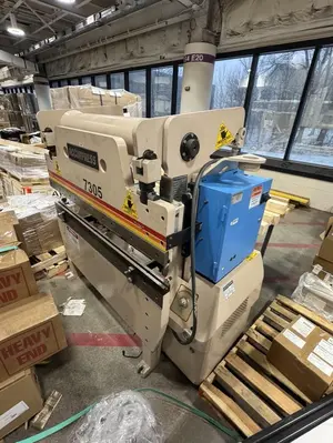 USED ACCURPRESS 7305