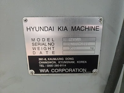 Hyundai HI-V50D VMC w/ 30-Slot ATC, Conveyor, (2) Kurt Vise, Fanuc Oi-MC Controller