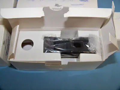 (24) Revolabs Wireless Lapel Mics / Microphones with (3) Charging Bases and (5) Replacement Mics that are NEW IN BOX