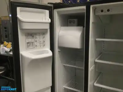 USED FRIGIDAIRE STAINLESS STEEL AND BLACK SIDE BY  SIDE REFRIDGERATOR HIGH EFFICANCY ENERGY STAR