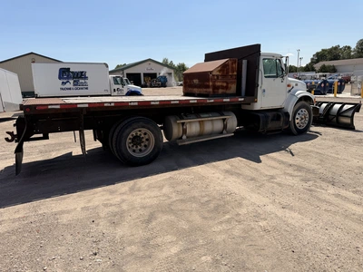 Used 1999 INTERNATIONAL 4700 4X2 WITH 10' SNOW DOGG PLOW Flatbed Trucks Michigan US | Miedema Asset Management Group #1410944