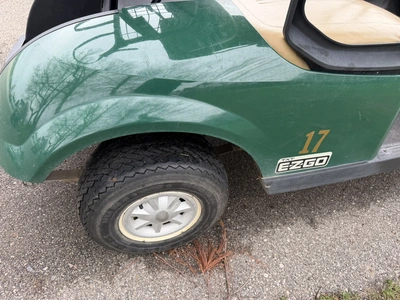 (1) 2015 E-Z-Go golf cart with a Kawasaki gas engine, does not include Club canopy, includes ball wa...