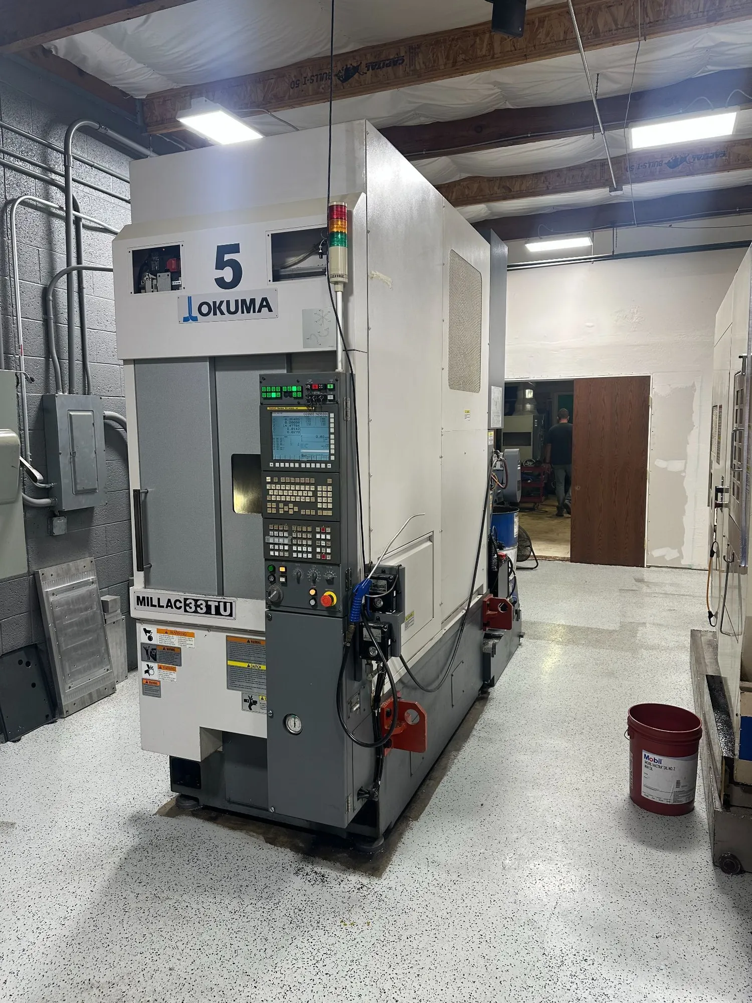 USED 2011 OKUMA MILLAC 33TU