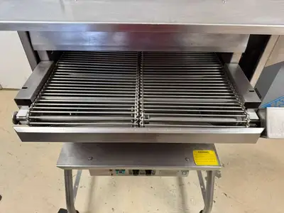 Used Nieco Used Nieco 820 Natural Gas Automatic Conveyor Cheese Melter 55,000 BTU Salamanders & Cheese Melters Illinois US | Falcon Restaurant Supply #1375029