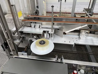 USED ECONOCORP – ECONOSEAL (RANDOLPH, MA) CASE PACKER (ECONOCASER)
