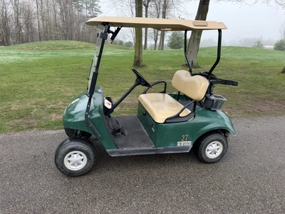 (1) 2015 E-Z-Go golf cart with a Kawasaki gas engine, does not include Club canopy, includes ball wa...
